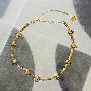 Dalmata gold skull choker necklace